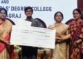 AMU law student Mohammad Suhaib receiving the Damodarshree National Award in Prayagraj